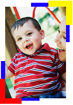 Happy little boy playing in the classroom